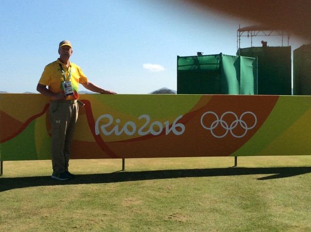 Duane in his Yellow Walking Scorer Olympic Uniform